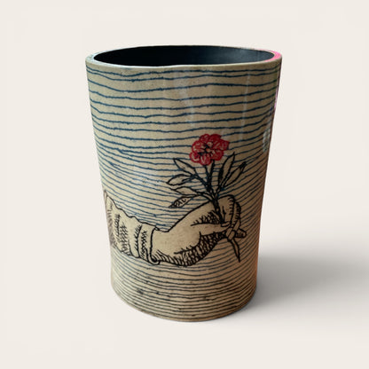 Jane Jackson Hand Holding Flower
