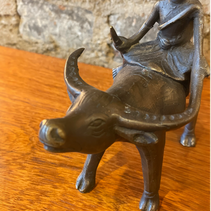 Bronze Sculpture 0f a Buffalo and Boy