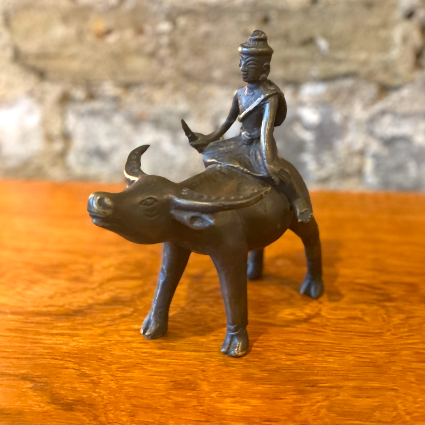 Bronze Sculpture 0f a Buffalo and Boy